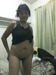 Filipina OFW Marie G. Gundran sexy and bold pics