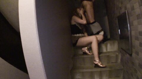 Japanese Babe Blows A Guy With Hairy Dick On The Stairs