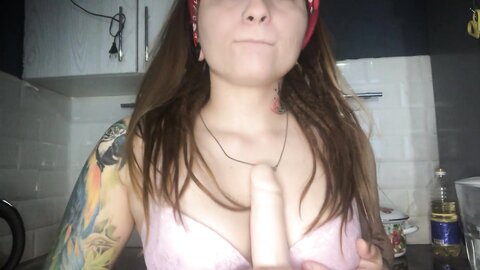Redhaired Asian Girl Sucks A Dildo And In Her Thoughts There Is A Dick