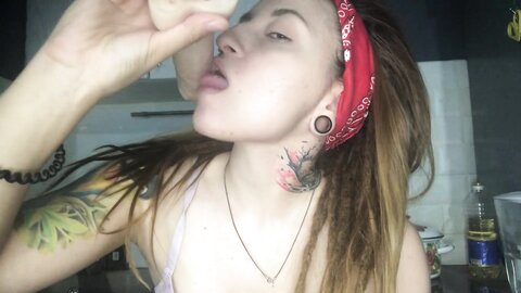 Redhaired Asian Girl Sucks A Dildo And In Her Thoughts There Is A Dick
