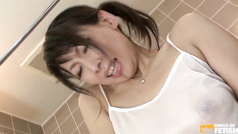 Horny Japanese Babe Takes A Shower And Plays With Her Bush